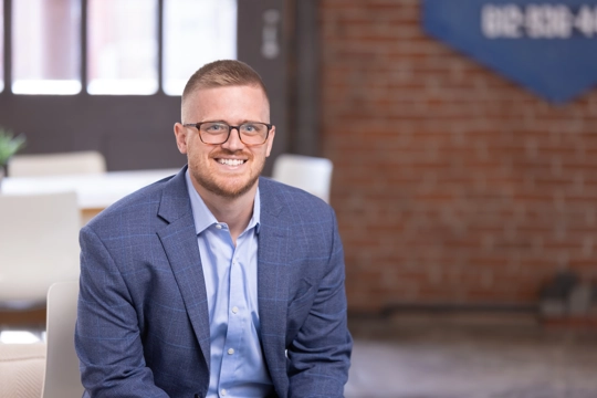 smiling person in professional attire